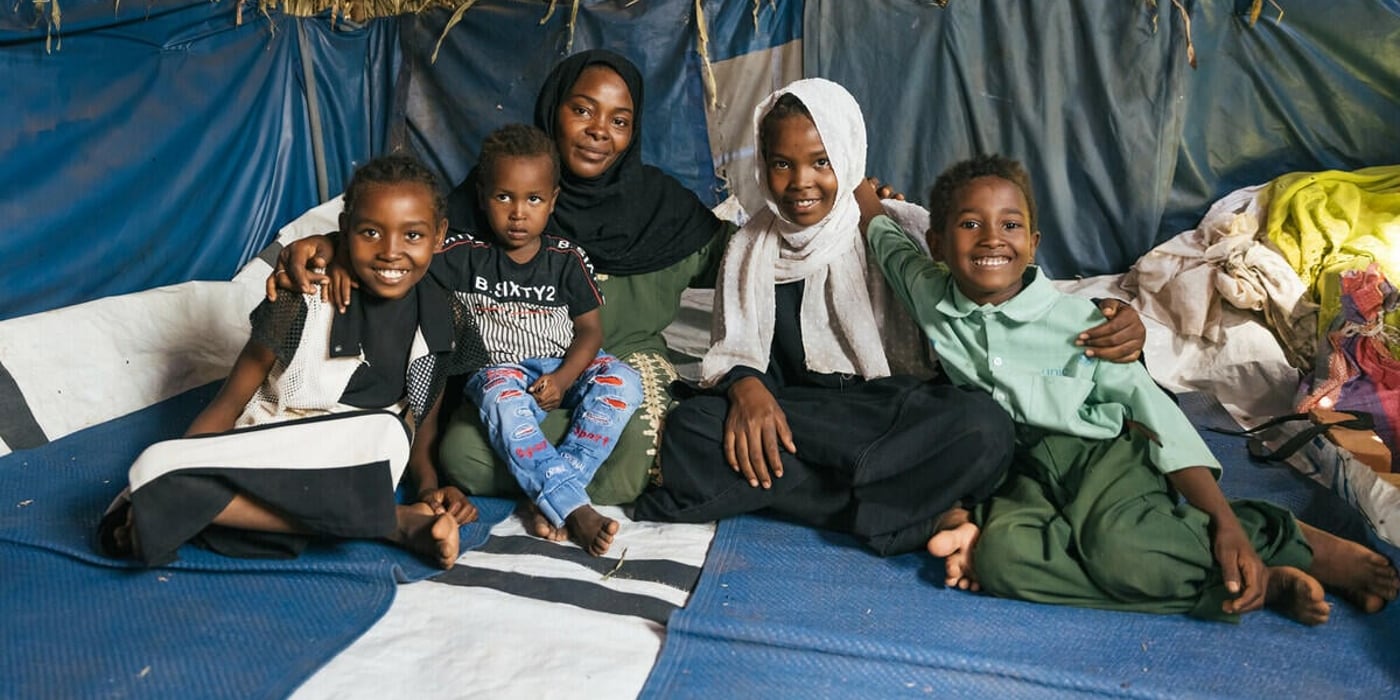 Portrait of a family from Sudan: Left to right: Tasabeeh, 12, Abdulbasit, 4, Hawa, Tasnim, 13, and Mohamed, 8.