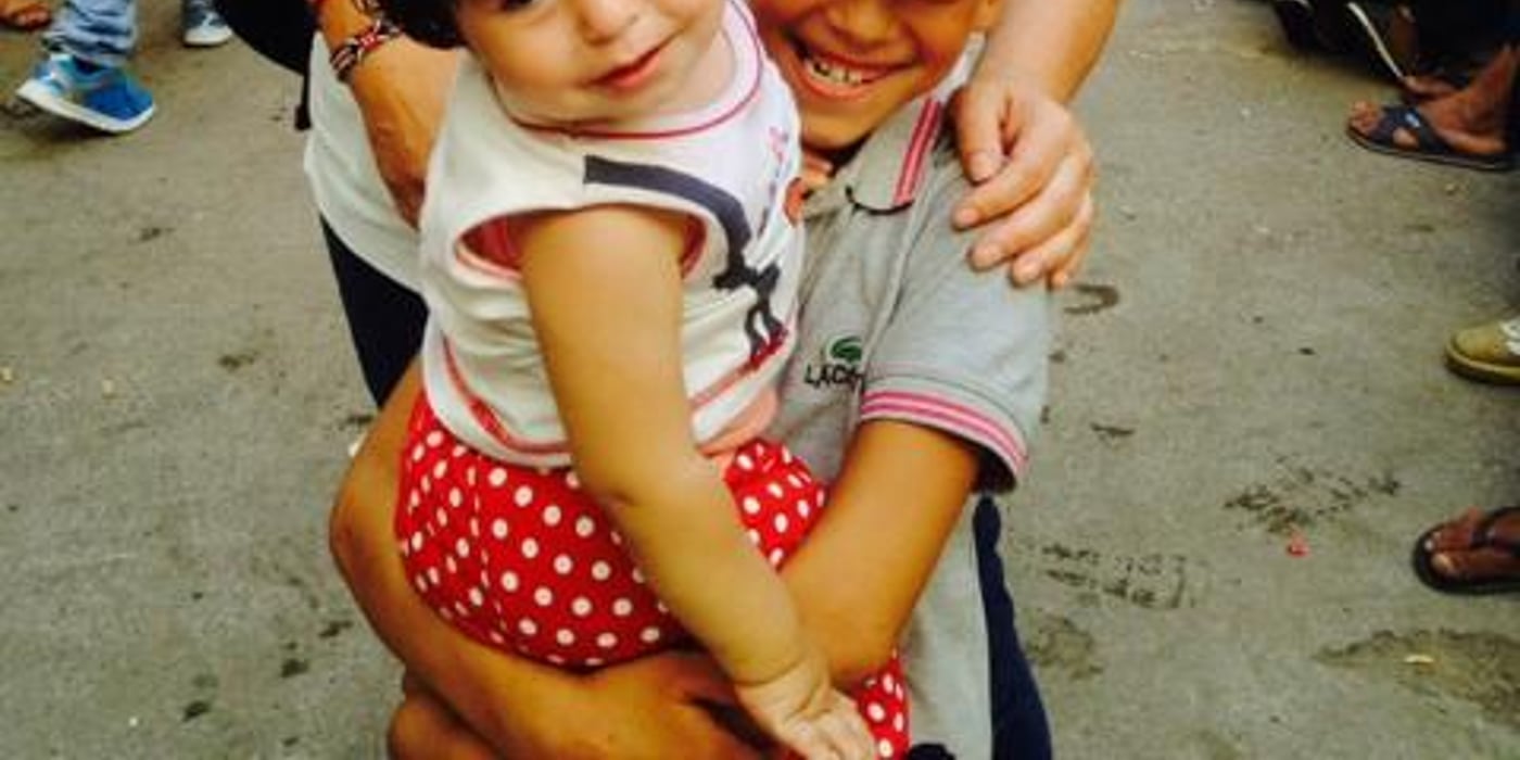 NORCAP child protection expert Trine Utne is deployed to UNHCR in Greece. (first on Kos, then Chios). The children are Mirna (1) and her big brother, Zaid (8) from Syria. They are travelling with their parents and 11-year-old brother to Athens where they have family who can help them. The children's mother is pregnant and the due date is 10th of September. Because of the pregnancy, UNHCR helped the family to get a quick registration so that the mother can get to Athens before the baby comes. (Photo: NORCAP)