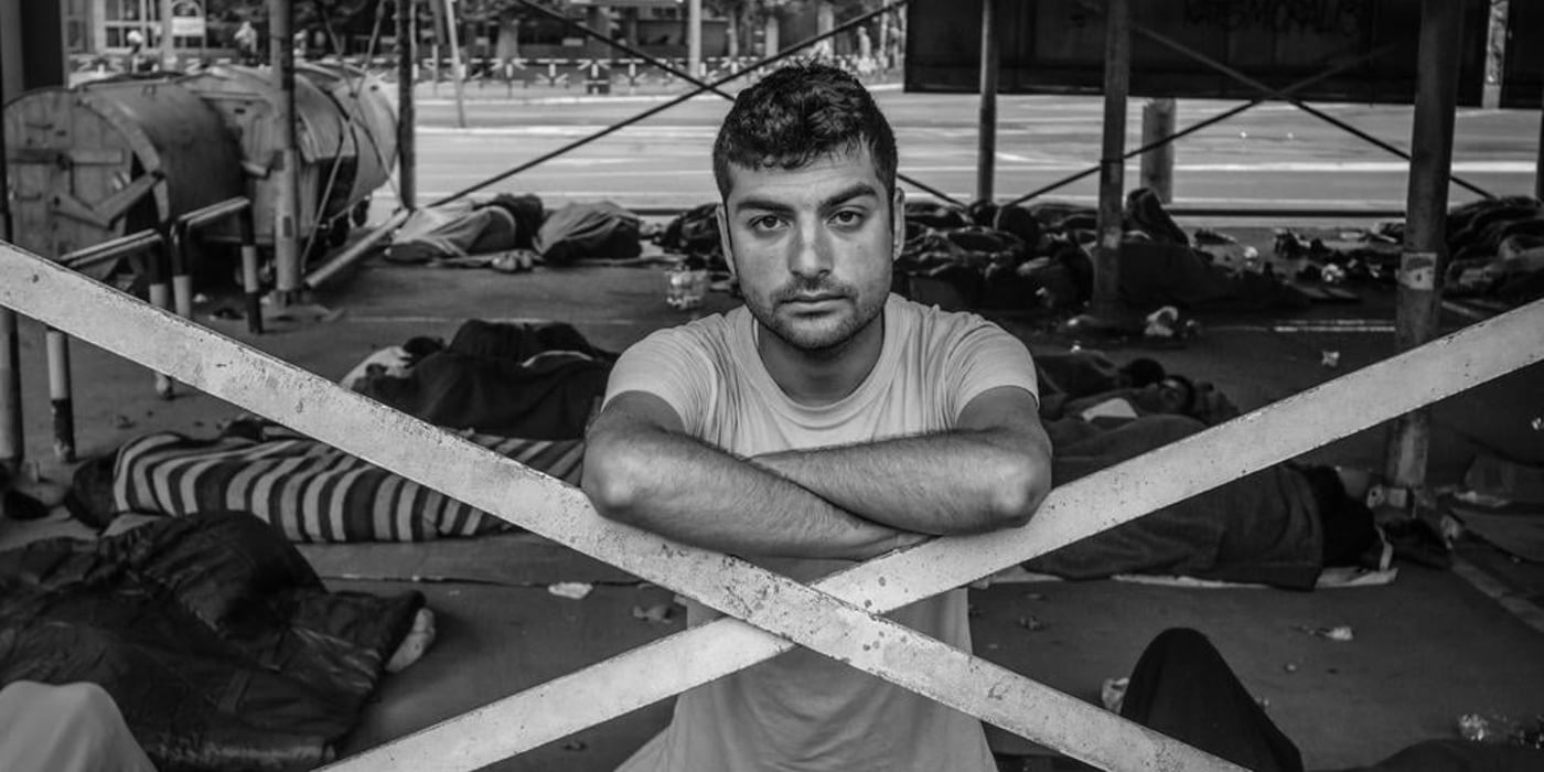 With the city's asylum centre full beyond capacity, asylum seekers sleep rough in a Belgrade city centre carpark.