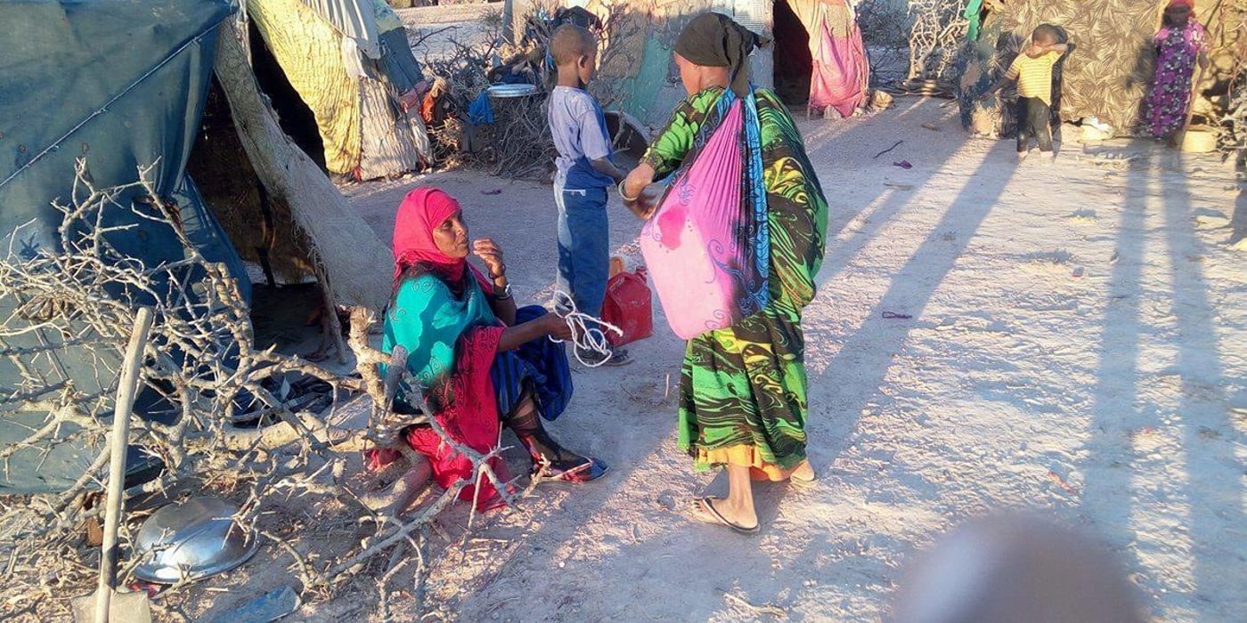 Hawa brings home water strapped on her back after trekking for five kilometres. Shimbroyow is a new IDP camp established in Fadhigabo district of Sanaag region to accommodate people displaced by drought in Somaliland. The IDP camp started with 54 drought-effected households at the beginning of the year, but now hosts more than 200 households.
Governments, aid agencies, donors and all concerned bodies must take priority action to counter the drought crisis which is threatening to spiral into a massive famine once all livelihood options are depleted. Download the inter-agency briefing note: http://bit.ly/2jPrha5 - Photo by Adam Ahmed