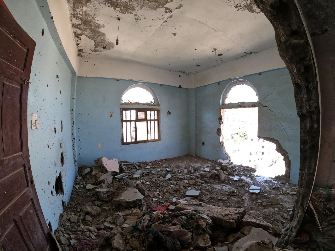 A photo of Abdullah's photo in Al-Zahrah neighborhood in Taiz city.
Photo: Khalid Al-Banna/NRC