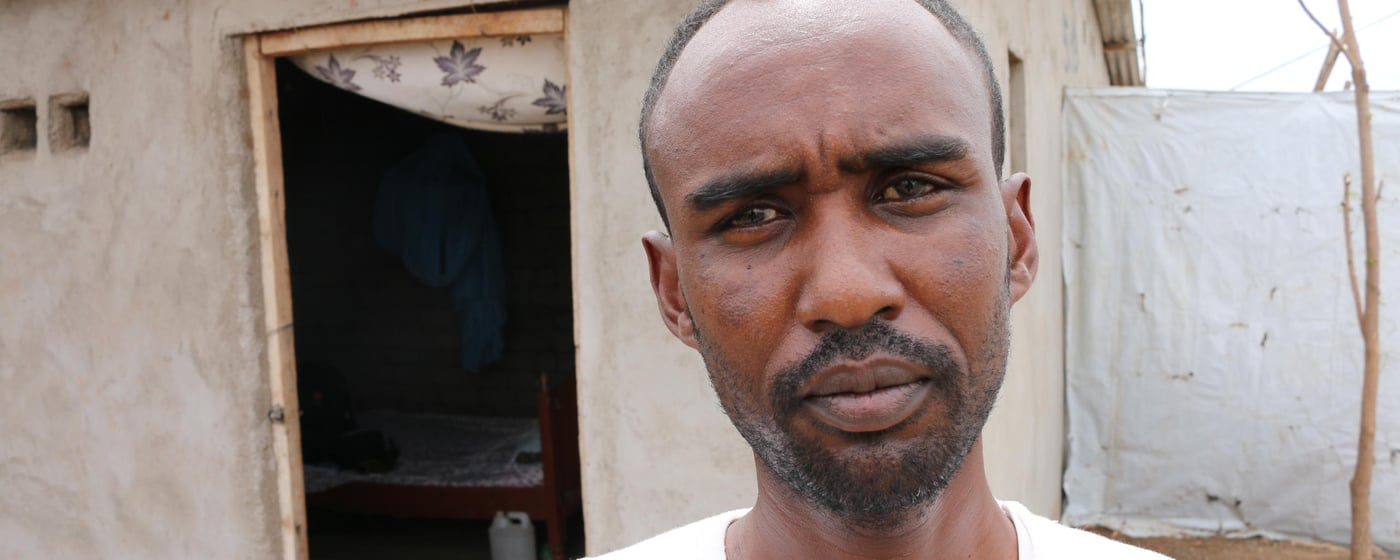 Hamsa Jama hassan (30) has completed all the stages required in the resttlement program. This includes medical check-ups and interviews. He has received a certificate of completion from the Resettlement Support Centre (Africa), or RSC, which confirms that he is eligible for resettlement in the USA and has satisfied all requirements. He has even been allocated a resettlement location in Richland, USA (Note for editors: Details and names of places are highly sensitive information, not for publication!)
However, Hamsa is not happy. He has folowed the political situation in the USA since the inauguration of Donald Trump. He has learnt about the latest ban on Somalis from visiting the USA. He feels bad about this. All his efforts seem to have been in vain. Although the ban is temporary (90 days), he suspects that it will be prolonged, or stricter measures are going to be put in place. He might have to begin his resettlement efforts from scratch. "There is no hope, I can tell you", he says.
Hamsa was born in Jilib, Somalia (near Kismayu) in 1987. Together with his uncle (who has successfully relocated to the USA), they ran away from militias in 1991 and settled in Dadaab refugee camp. Later he was relocated to Kakuma to enable him to continue with his resettlement processing. Photo: NRC/Nashon Tado