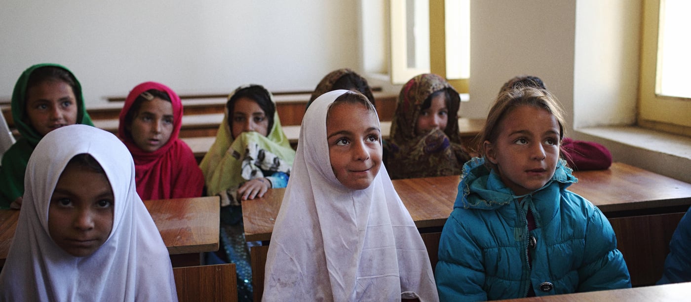 Girls attend class in a classroom at a school in Khost Province that has offerend their grounds to boys and girls that were among the thousands that fled North Wazristan in June when the Pakistani Military began an offensive against insurgent groups such as the Taliban in the western tribal areas of the country after several, high profile attacks on Pakistani soil.
Photo: Andrew Quilty / Oculi for Norwegian Refugee Council