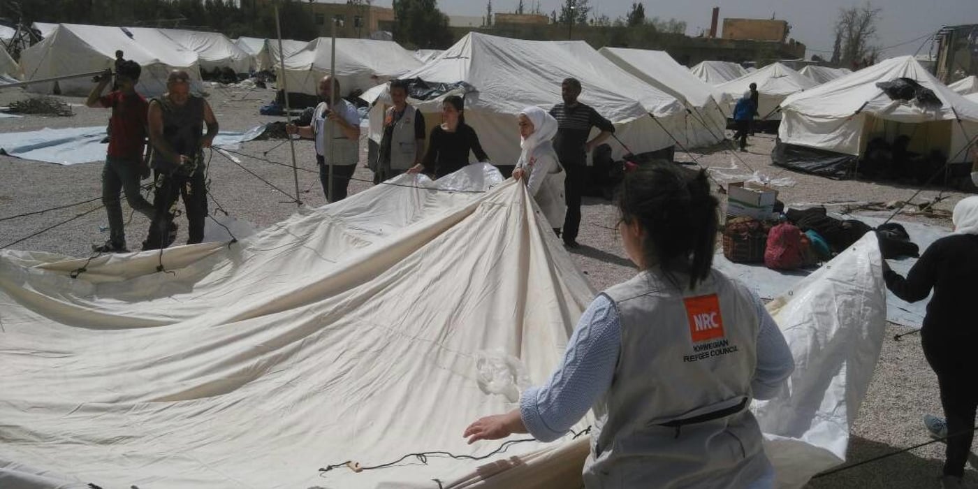 NRC teams at the Adra IDP Centre in Damascus responding to the massive influx of IDPs from Eastern Ghouta. The influx was sudden, with high numbers of children, together with women, men, youth and elderly persons. 

Photo: NRC