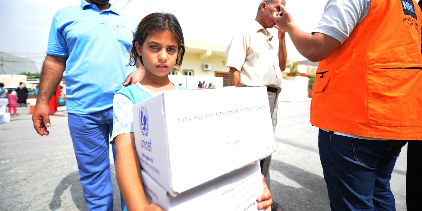 Lamiha (8) is an Iraqi IDP from Ramadi, Anbar. Together with her mother and 8 other siblings she had to flee their home when war broke out. Lamiha has lived in displacement in Erbil for 5 months and does not attend school.
NRC distributed emergency kits (containing water bottles, hygiene items, a bucket and canned food ready to eat) to approximately 30 newly displaced IDP families in the urban settlement of Mamzawa, Erbil. The distribution is part of the Rapid Response Mechanism where NRC works together with partners UNICEF and WFP in order to reach out to newly displaced with emergency aid.
Photo: Karl Schembri/NRC