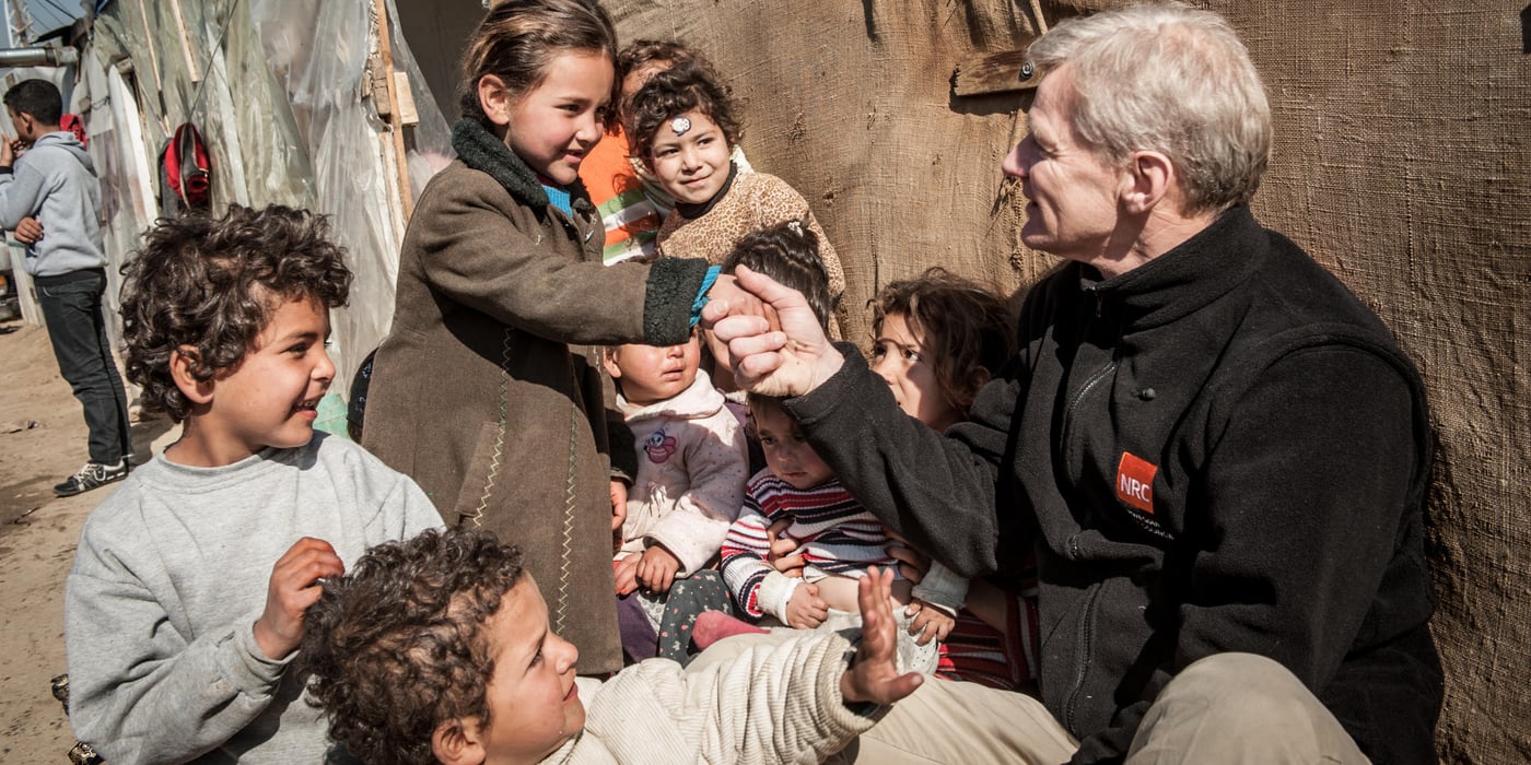 Secretary General Jan Egeland, here with Syrian refugee children and greeting Mirijam, 8, visited Lebanon's Bekaa valley to prepare for Artistgalla. Here they met Syrian refugees living in improvised tented settlements.
