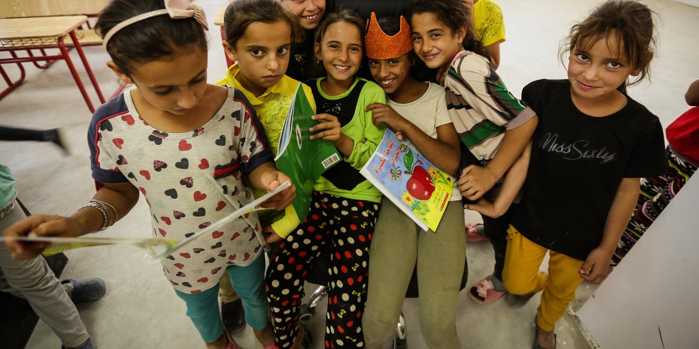A group photo for grade three girls at NRC's learning centre in Azraq Refugee Camp.
July, 2015.
Photo: NRC/Hussein Amri