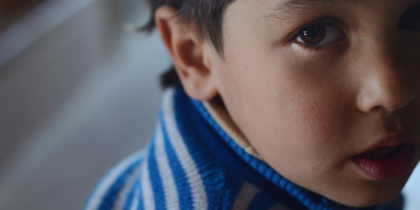 Three year old Omar at his house in Irbid, 70km north of the capital city Amman. Omar and his family are one of the Norwegian Refugee Council's beneficiaries who live in a rent free apartment in Irbid. The provision of rent-free shelter led to four-fold decrease in child labour in households supported by NRC. Many were also able to start sending their children to school again as they could cover the associated costs of transport, school equipment and uniforms. Photo by: Alisa Reznick, March 2015