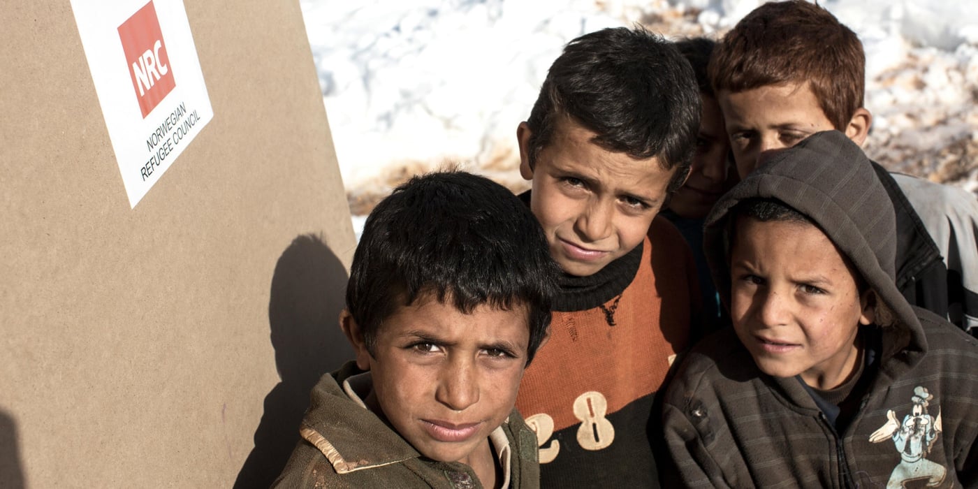 A child-friendly space funded by  the European Commission and run by NRC, at an informal tent settlement for Syrian refugees in the Bekaa Valley, Lebanon.

With Storm Zina raging across Lebanon, hundreds of vulnerable Syrian refugees living in tents have been badly affected by the cold. Those living in the Bekaa Valley have been particularly badly hit as temperatures fell well below zero. NRC staff distributed wood and plastic sheeting to prevent their homes from collapsing, as well as drainage kits and sand bags to prevent tents and latrines from flooding once the snow starts to melt. NRC is also delivering clean drinking water and helping empty latrines and septic tanks safely.

Photo taken on Thursday January 15.
[Sam Tarling]