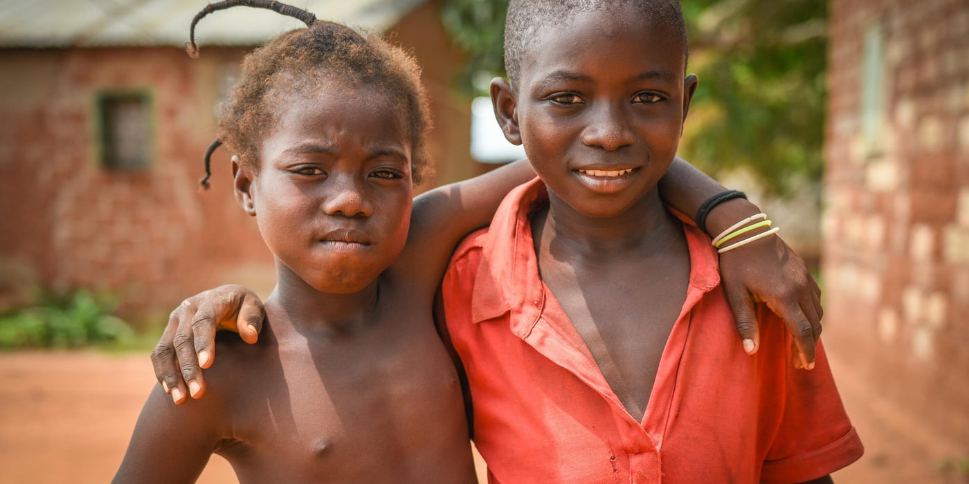 Arsène (12) and his little sister Zita (10) are happy to be back home! Their family was forced to flee in 2013, and for several years they had to stay at a displacement site outside Bangui. Now they have returned to their home in Begoua at the outskirts of the city.
NB: This family has not received any assistance from NRC - but they are currently hosting one man who will receive a new home with the support of NRC.
When Central African Republic was struck by violent conflicts in 2013/2014, people from Begoua at the outskirts of Bangui fled their homes and found safety at displacement sites close by. Many saw their homes being occupied by armed groups, looted and burned. Now, many of the families from Begoua have returned home. The Norwegian Refugee Council is helping families rebuild or rehabilitate their houses and is also helping establish who owns the different plots, and provide people with a paper proving their property rights. The project is supported by UNHCR.
Photo: Norwegian Refugee Council/Tiril Skarstein