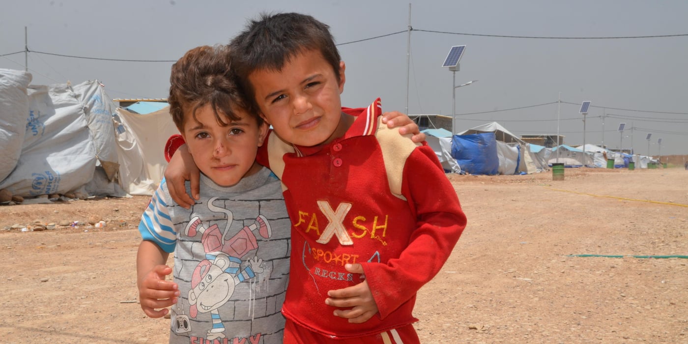 Iraqi IDP children playing in Baharka camp for IDP's in Erbil, Iraq. 

Photo: NRC/Becky Bakr Abdulla