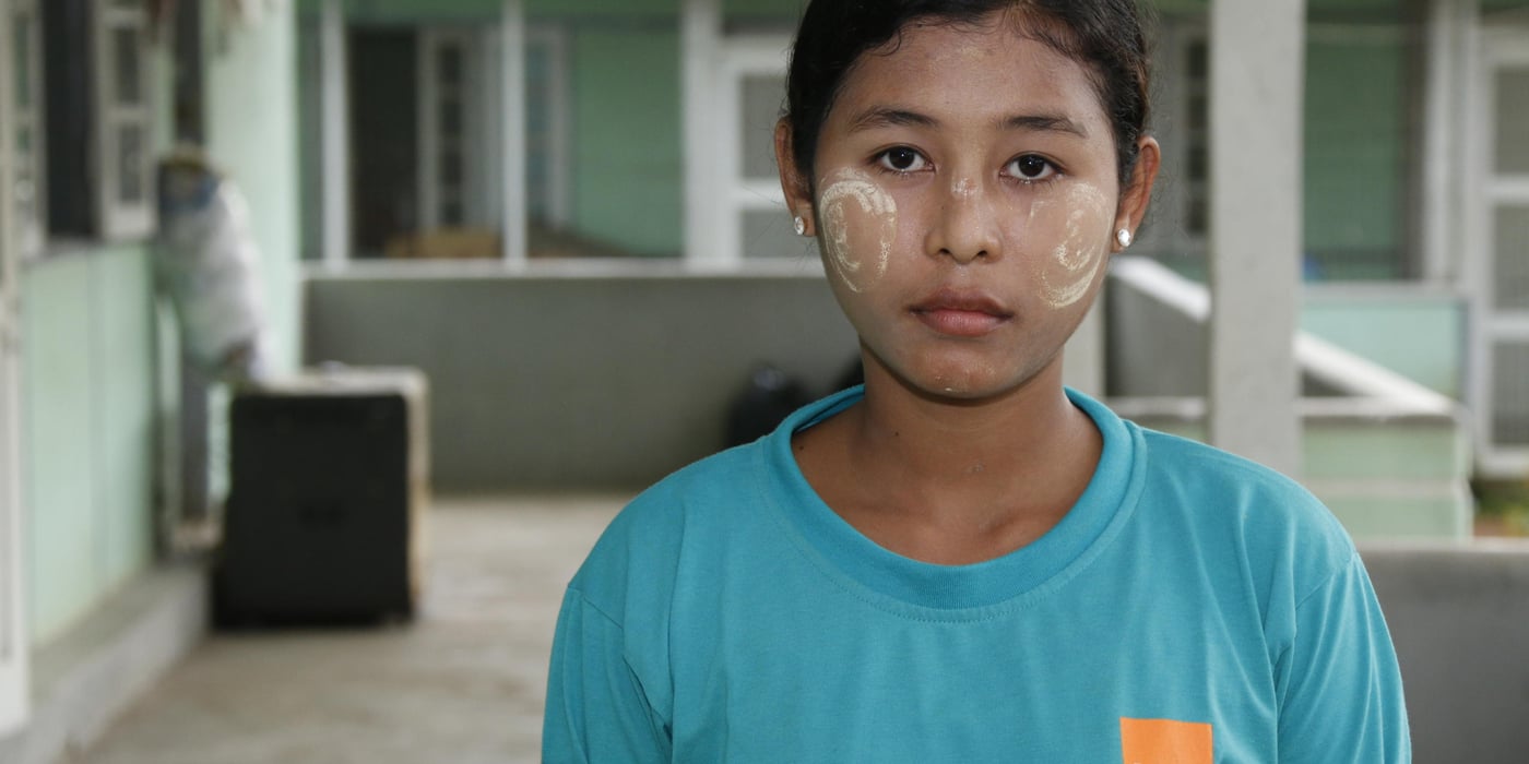Phyu Phyu Tang, 19 years old is the eldest of 6 siblings. Her mother is dead and her father suffers from severe cancer so she must take responsibility for all of her smaller siblings.
She was not allowed to go more than 3 years at school. As soon as she was old enough, she had to contribute to the family by taking jobs as dayworker on other peoples’ farms. The jobs were very hard and tiring and pay was low. Outside the season she picked water grass (popular food snack in Myanmar) and sold on the streets in the village where she lived. This is dangerous work, often on deep water. She would also fish with a small fishing net and sell the fish she could catch, on the streets.
With her limited reading and writing skills she has to work extra hard to follow the education, but he is determined to succeed. And she feels that he has to succeed. When there are things that she does not understand, she asks the teachers after class, or some of her classmates. “I must succeed – there is no other way….” she says silently.
The NRC YEP center educates students from 18-25 years of age. The YEP center has 100 students and teaches the students to learn a profession and to start up their own little business. The aim is that they will be able to support both themselves and their families.
The education includes different life skills so that the students will be able to cope with challenges and obstacles of personal and interpersonal nature when they start their business. They also go through a Small Business Program, including reading and writing, mathematics and calculations.
The students can choose between motorcycle repair and tailoring.
Photo: NRC