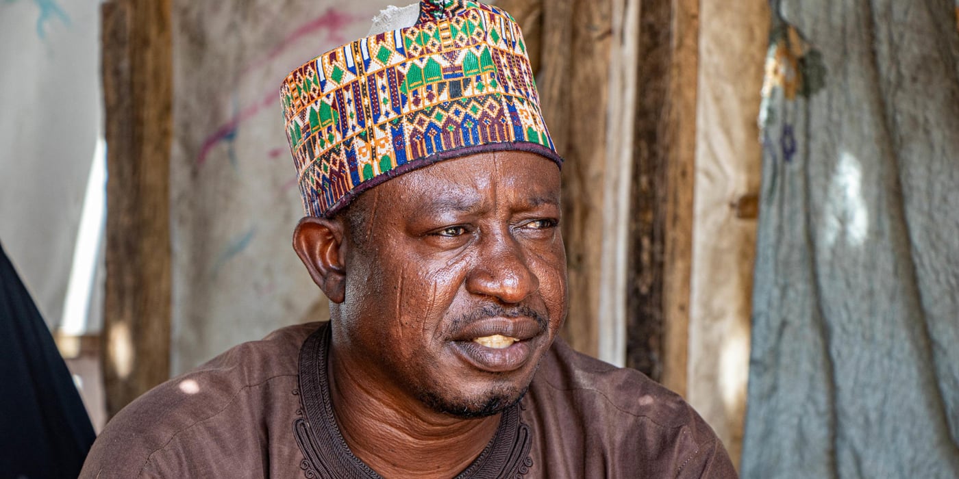 "I remember the day, it was the 11th of February 2014. Armed men stormed the market in our village and started shooting sporadically" This was the day his life changed.

Bukar, a well to do businessman had to flee a place he had called home for years. His house, his fish business all burnt to ashes. 

He had to escape with his wives and children and to survive he separated himself from his family as able-bodied men were instantly killed. 

Today, he stays with his family in a displacement camp. They are solely dependent on the government, humanitarian organisations and well-meaning individuals for their basic needs. 

They want to go back to their village in Konduga but do not believe it is safe to do so. However, they do not have a choice because when the government comes to take them back, they would have to go - whether or not it is safe to do so. 


Photo: NRC/Samuel Jegede