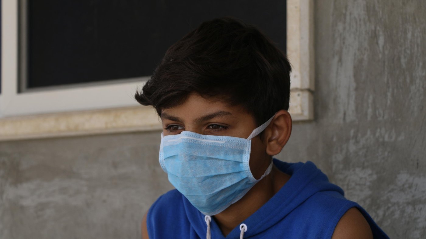 Photo: Zaynab Mayladan/NRC
Description: Ibrahim (13) is originally from Aleppo, Syria but fled to Lebanon five years ago because of the conflict. He says he felt "slightly relaxed" when he left the war zone but now "everything has changed."
"Everyone is talking about it. Every day there are cases of people dying so we feel afraid."
"School means everything to me. I love to study. When I was at school, everything was normal. But now it's all changed. I used to be happy but now I'm sitting at home alone talking to no one. When I'm stressed, I start having headaches. I do the breathing exercises (from NRC's Better Learning Programme) to calm down."