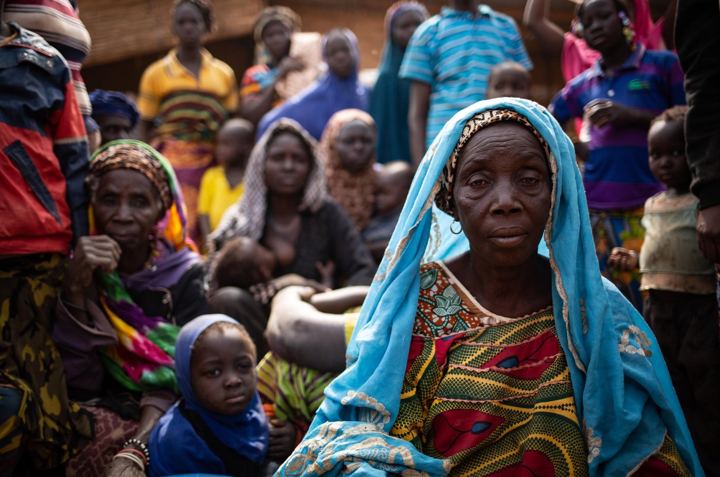 Fatoumata, 67 and her family moved several times to escape from armed attacks. Originally from Sigue-Raguin, she fled the first time to seek safety in Foubé. But the executions and threats continued and they had to flee from Foubé to Kaya.

"The armed men have chased us away from our homes and killed our loved ones. That’s why we fled and came here. We don’t have any food, we don’t have a roof over our head, we have nothing at all. We are asking for assistance." She said.

"We left yesterday and arrived here today. We haven’t eaten anything since the sun rose. 

Just the day before yesterday, 6 people were caught and killed while they were on the road. After this, the attackers went to… I don’t remember where, but so many people have been killed. 

We were all filled with fear so we immediately took to the road and by the grace of God we were able to escape. Our wish is to settle down in peace and receive some food or any other assistance. What we need the most is some assistance and a place where we can stay. All we are praying for now is to receive some assistance." Fatoumata added.

Date: 21 January 2020
Location: Kaya - Center North Burkina Faso
Photo: Tom Peyre-Costa/NRC