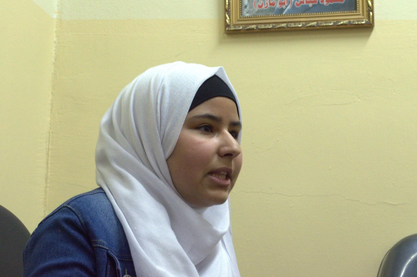 "They do not want us to come and go freely," says Muna, 11, whose apartment building adjoins the Qafisheh checkpoint in Hebron's Tel Rumeida neighborhood.
Photo: Ivan Karakashian/NRC