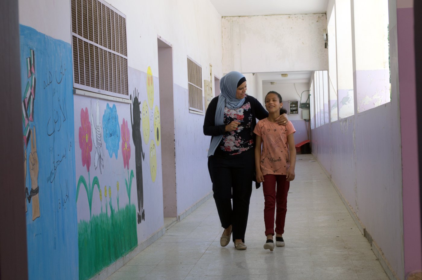 Tasneem, 11, enjoys a close relationship with Kawkab Shelbaya, the guidance counselor at Madama Mixed Secondary School.
Photo: Ivan Karakashian/NRC