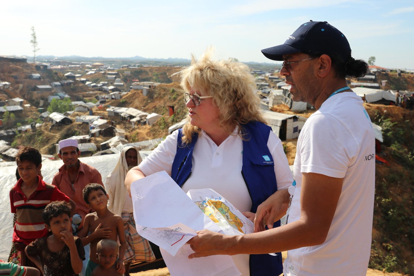 NORCAP Director Benedicte Giaever (left) with site planner Shyam Sundar in Balukhali camp in Cox's Bazar. (Photo: Ingrid Prestetun/NRC)