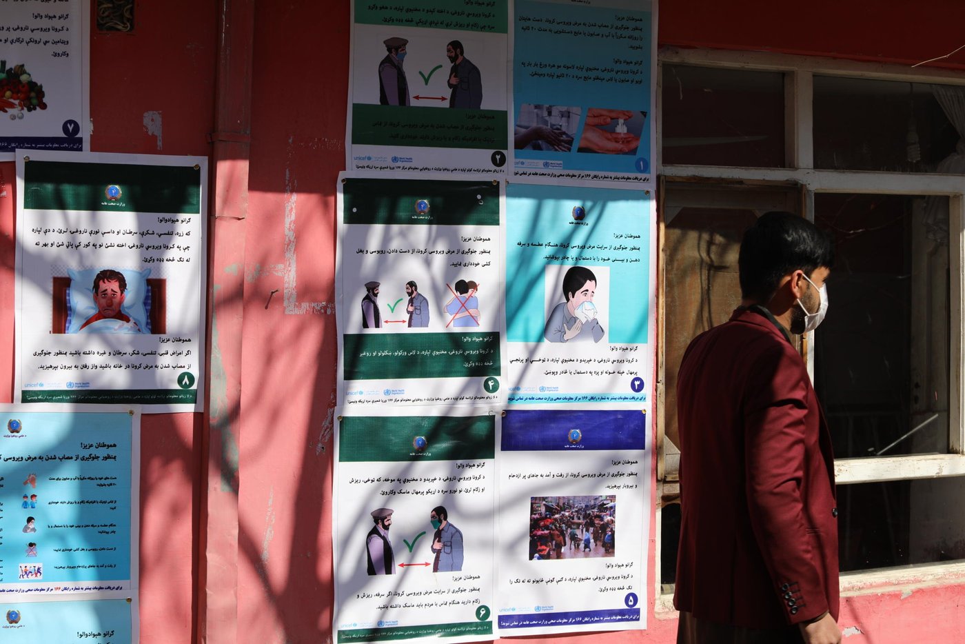 Inside NRC camp management center in the outskirts of Kabul city, our staff provides masks to visitors from the camp and also guide them on prevention measures and train them how can they reduce any potential risk of infection to them and their family. 

NRC Camp Management is working in 20 settlements consist of 4000 households and 35000 individuals, out of  52  informal settlements in Kabul. Photo: Enayatullah Azad / NRC