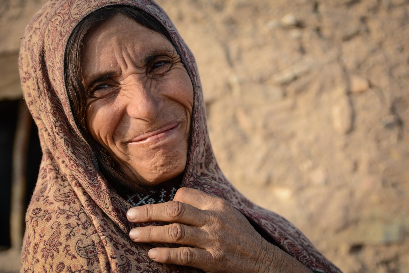 HazarGul (50) mother of eight, has been displaced three years ago from her home in Jawand, Badghis Province to Shaidaee camp in Herat. Now they are living in Shaidaee Settlement.
Quote:
At this moment, we are hungry and thirsty. What else we can ask for apart from food. My children are small and my husband is paralyzed. I am going out in the city and begging for people to feed my children.
Photo: NRC/Tiril Skarstein