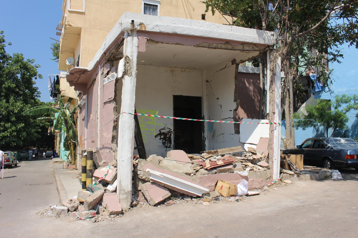 “We have lived in this building for 27 years. I have witnessed all the wars and conflicts in Beirut but never have I seen Beirut so severely damaged as this,” says Hayat. “The scene outside our home looked like a battle field, beyond what you can comprehend. People were running around in panic, bodies on the ground, blood everywhere, buildings falling apart, cars under the rubble and glass shatter all over,” she says.  

“We have a lot of needs now, the windows, curtains, and furniture are all damaged. The glass shatters destroyed everything and the walls have fallen down. My kitchen is not functioning and the water pipes are all broken. We need our homes to be repaired urgently but we can’t afford the repairs,” Hayat says. “We don’t know when we will get assistance but we need everyone’s help to rebuild the streets of Beirut,” she says.  

“When I look at the destruction around us, I can only say we were saved by a miracle,” says Hayat. “In the end all the material damage can be replaced, we can eventually buy new ones but a life can’t be replaced,” she says. 

“Imagine, one of the neighbours in the building next to ours is Syrian. He has been living alone for a while and his family in Syria. A few weeks ago, the situation where his wife and two daughters live in Syria worsened so he brought them here to be in safety and escape the war. But they didn’t escape death, the roof fell over them in the explosion and his wife and two daughters died. If you see him now, it’s like he has gone mad,” she says. 

“My husband died when my children were very young and I raised them as a single mother. I put all my heart and effort to raise them and keep them safe. My biggest fear is to lose them now when they are adults. They are my whole life and if something happens to them I wouldn’t be able to handle it. The situation in country has become unbearable. Our hearts are broken, the people are tired and Lebanon has suffered enough,” Hayat concludes. 

Photo: Racha El Daoi/NRC