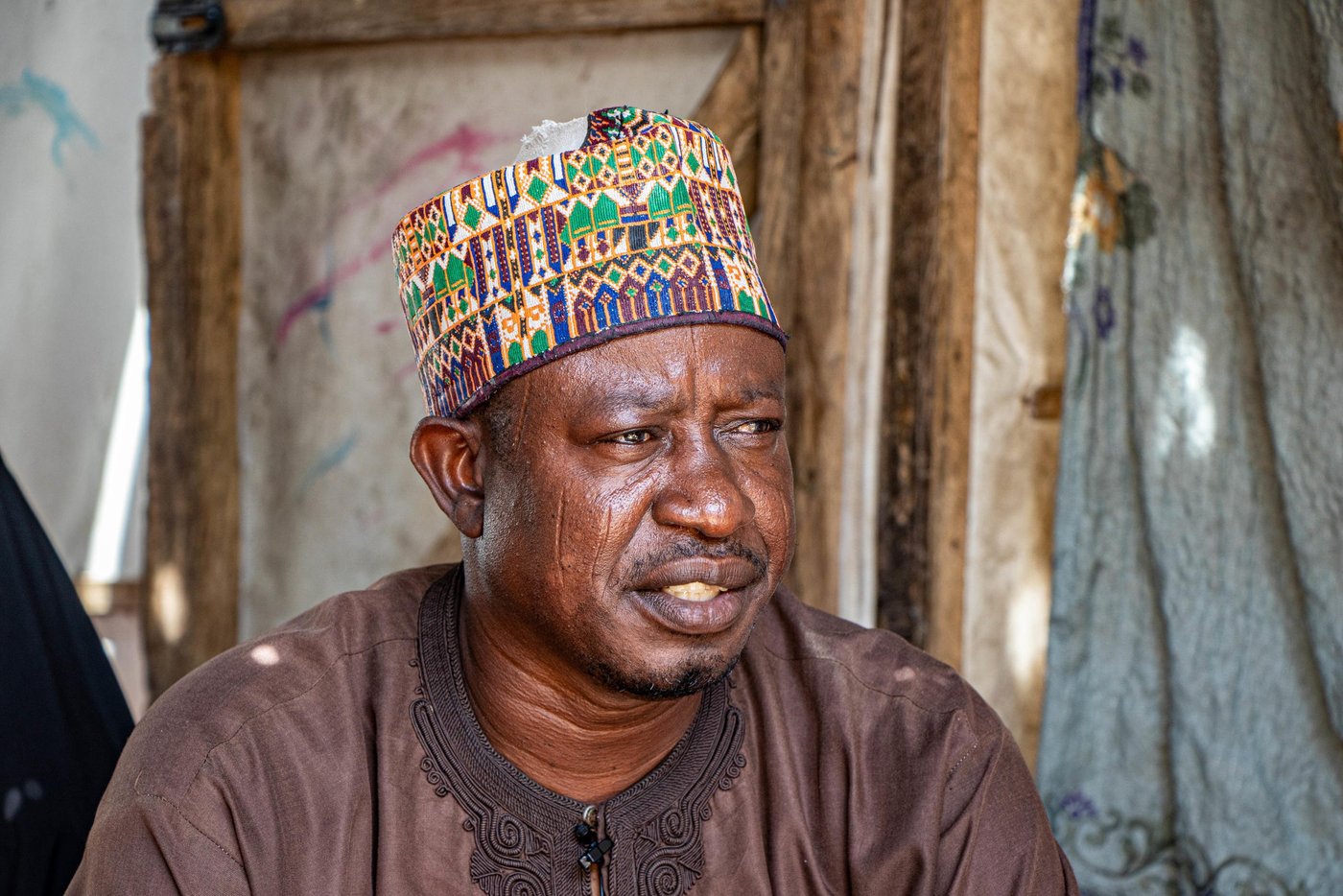 "I remember the day, it was the 11th of February 2014. Armed men stormed the market in our village and started shooting sporadically" This was the day his life changed.

Bukar, a well to do businessman had to flee a place he had called home for years. His house, his fish business all burnt to ashes. 

He had to escape with his wives and children and to survive he separated himself from his family as able-bodied men were instantly killed. 

Today, he stays with his family in a displacement camp. They are solely dependent on the government, humanitarian organisations and well-meaning individuals for their basic needs. 

They want to go back to their village in Konduga but do not believe it is safe to do so. However, they do not have a choice because when the government comes to take them back, they would have to go - whether or not it is safe to do so. 


Photo: NRC/Samuel Jegede