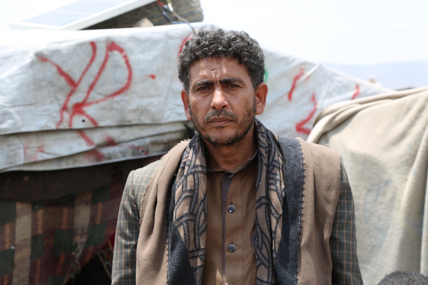 Mohammed Al-Hawsali, a displaced man in Souk Al-Lail camp in Amran governorate confirmed that displaced people are in dire need of the basics so they are scared of COVID-19.

“We live inside tents in this camp and there is no enough water and no money to buy soap, Mohammed says. “We practice our regular life and we go to the market to work so we’re worry that we will be the weakest victim of corona.

Mohammed confirmed that they didn’t take any precautionary measures into considerations: “If we don’t go to work, we won’t find food to eat so we are forced to work as there is no food in our tents and no money in our pockets.”

Photo: Nasser Abdulkareem/NRC