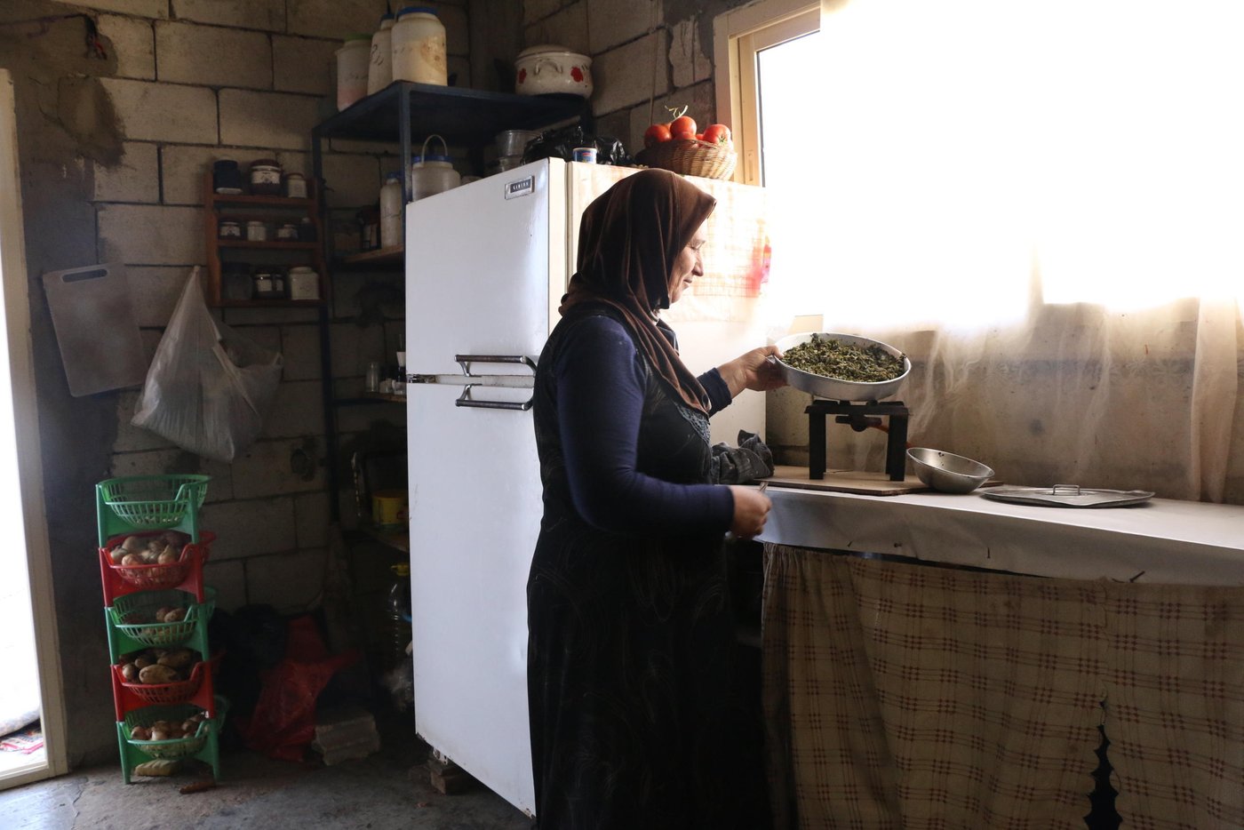 A month ago, Safaa’s family was evicted from a shelter they did not pay rent for. They were forced to pack their belongings and look for another place. “The landlord wanted to rent out the house to another family who could pay him. We had no place to go and we begged him to stay until the end of the winter but he refused and locked us out,” Safaa explains.
Safaa and her family therefore built a small tent in a nearby field covering it with plastic sheets; it had no bathroom facility or kitchen supplies. Safaa hoped it would be a temporary solution. But the cold was unbearable and as the rain, snow and wind battered the tent, Safaa’s family feared their safety. They were vulnerable, they could not heat the tent, and felt insecure about their future.
Safaa’s family spent a month in this tent before getting in touch with the Norwegian Refugee Council (NRC).
Safaa’s family now is able to enjoy a cozy place with windows, doors and blankets at nights. Their new house has been life-saving for Safaa and her children. It is different compared to living in a tent and she has made the house into a home. She has created a space for the children to have fun and play, to watch TV and do their homework. They can finally feel safe. They have been given a feeling of peace and security in their challenging life as refugees. Now, they can hope for a better future.
Photo: Nadine Malli/NRC