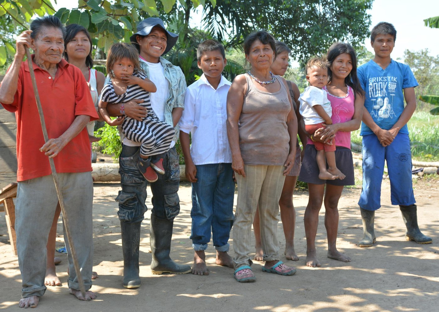 Vincente and his family stand in their garden.
Vicente (left, red top), his daughter Luzdary (middle, beige top) and Andreas (right, blue top) are three generations of Jiw that have finally returned to their ancestral lands. They are part of a group that the Norwegian Refugee Council has helped to return to a place they can finally call home.
Traditionally a hunting tribe, Andreas proudly shows off a spear he uses for hunting.
“There are fewer animals nowadays than before though, and the men in the community must walk up to 8 hours when they go to hunt meat to feed the community,” says Andreas.
Andreas wants to work with computers when he finishes school. “People who work on computers make more money,” he laughs.
Vicente recognizes that the numbers of their people are falling. “Some families were as big as 50 people before,” he recalls. “But now are as small as 30. They left for the towns.”
Neglected communities
A peace deal signed in Colombia in 2016 paved the way for the country to rebuild, after the decades-long war.
International organizations are keen to support, and funding is coming in for development projects like strengthening peace. However, small communities like the Jiw who are in humanitarian need have been somewhat neglected.
Building a future
The Norwegian Refugee Council has been working with the Jiw Community in the Guaviare region since September 2015. We are helping to rebuild homes for hundreds of displaceden, women and children returning to their ancestral lands. We provide free legal counseling so that people know their rights on land issues. We also support children to return to school.
Date: February 2017
Photo credit: NRC / Michelle Delaney
Text: michelle.delaney@nrc.no