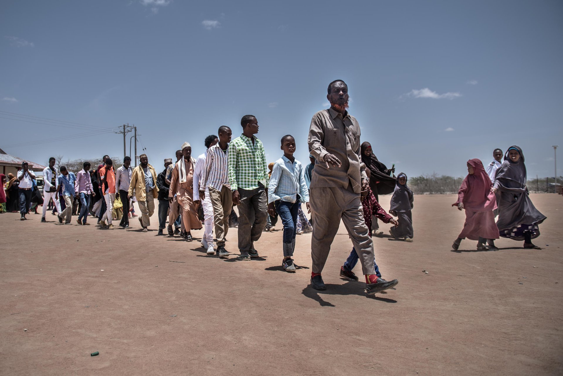 Families board a plane to Mogadishu, Somalia. Over 40 Somali refugee families are returning to Somalia today.
About 23,000 refugees who have left Dadaab camp this year to return back to Somalia. They are part of a return programme set up by the UN’s refugee agency and the Government of Kenya. NRC is working to ensure that people returning to Somalia are given information about the areas they are going to, and that process is well coordinated and returnees are protected.
Date: September 2016
Photo credit: NRC/ Fredrik Lerneryd