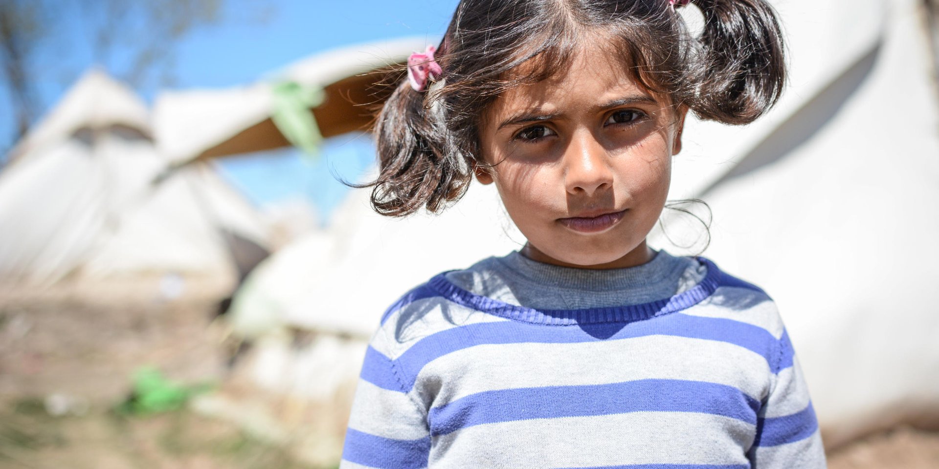 Amani (6) - Kurdish refugee from the conflict in Syria and Iraq. 
Her father is in Germany. She has arrived the camp Cherso in Greece. Photo: Tiril Skarstein, NRC

-I am not happy here. I wish I could go to Germany to see my father. He is allready there. Why can we not go to him?, asks Amani (6)