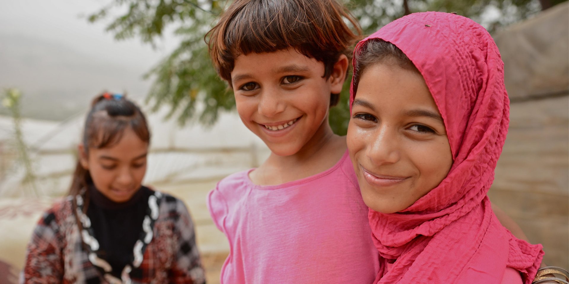 Syrian Asmaa (12) and her little sister Doha (7) are living in an informal tented settlement in North Lebanon.
Photo: Tiril Skarstein, NRC