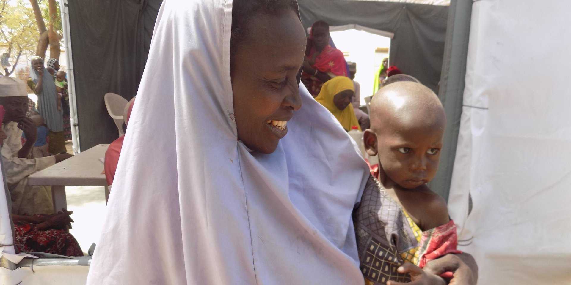 Kaltima's 2 year old son suffers from severe acute malnutrition, as determined by NRC hygiene promoters in Shuwari, Maiduguri (NRC Nigeria/Rosalyn Velds)