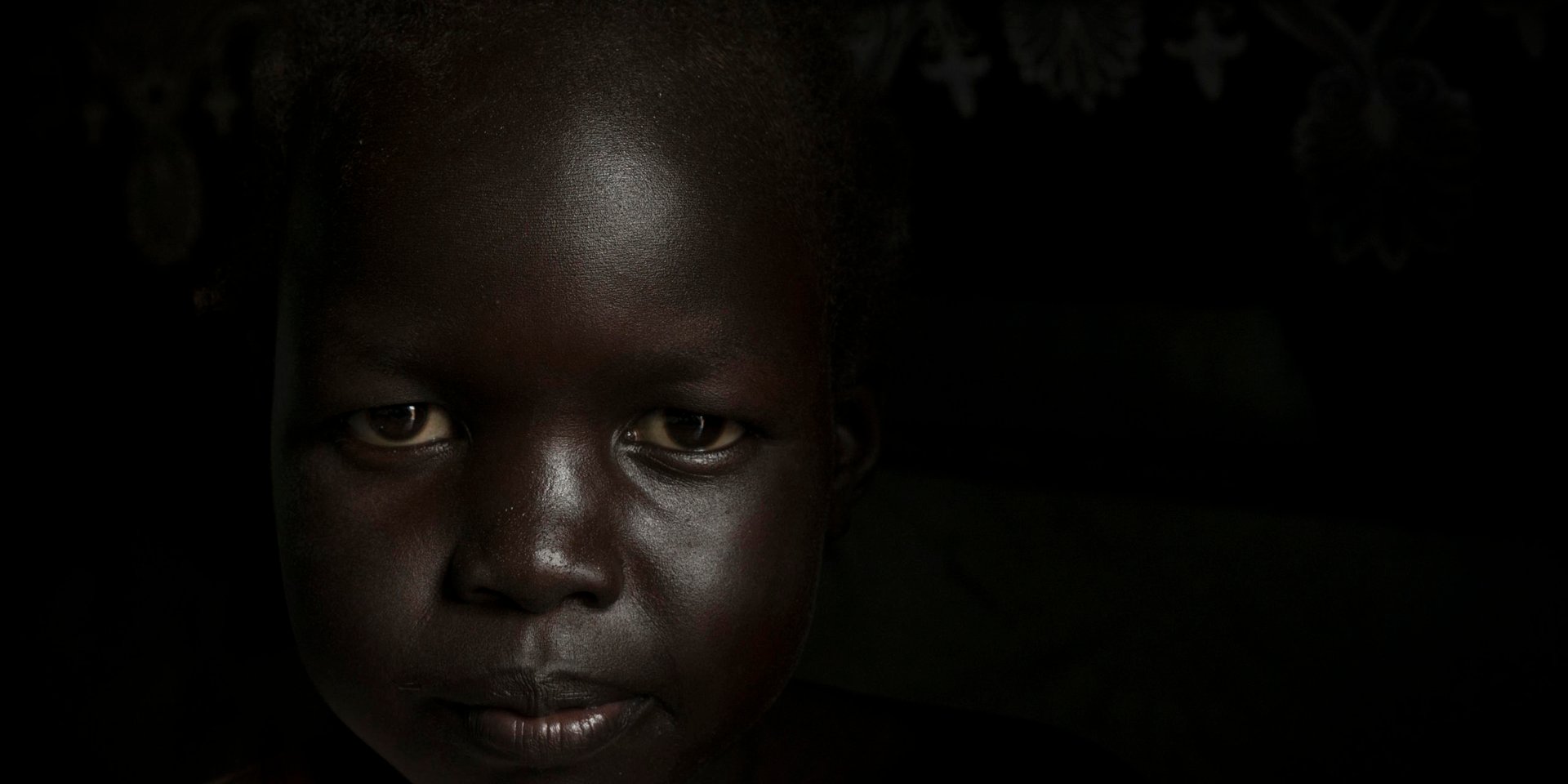 Nyanua Tut, 8, in her home in the Protection of Civilian site for displaced people in Juba, South Sudan, August 10, 2016. ©NRC/Adriane Ohanesian