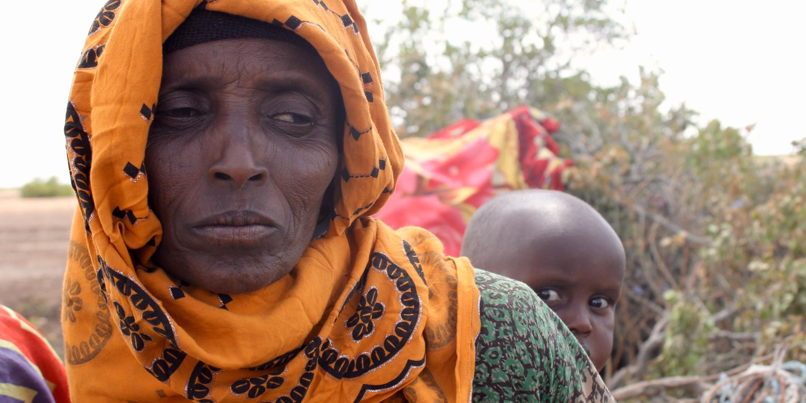 Maryam Ige Musse shows us her last livestock lying on the ground. Dead due to heavy rain. "They were the last of a livestock of 200 animals," she says. She says the child cry all the time due to hunger. She has nothing to ease his pain, she says.
"The drought has weakened the animals and the rains have taken them away. I had lots of animals but some were lost from the drought and others were lost from the rains. I had Around one hundred"
"This is not life. It is our destiny, one day you can get and another day you don’t get. The government is giving us beans. Thats all."
"I only cook a little black tea, without sugar. I did not get sugar. That is why he is crying; because he is hungry."
"The illness starts from hunger, even when he stands us he gets dizzy and falls down.
He is hungry. In the morning and evening he keeps vomiting. If I get sugar I will mix with water and give him. But if I do not have I cannot do anything."
"We are only living thanks to God. Before the drought, it was good. The government was giving us food. From the livestock, we got milk for tea, and meat. But with the drought, we lost the livestock.
We want something to eat. But we do not have it. We need to get food. We cannot reach nearby towns because our donkeys have died from the drought."
"What I can say is that we have a problem. The main problem is hunger. Bring us something to eat. We are lacking shelter, food. This is where we live. We do not have anything to fetch the rain water."