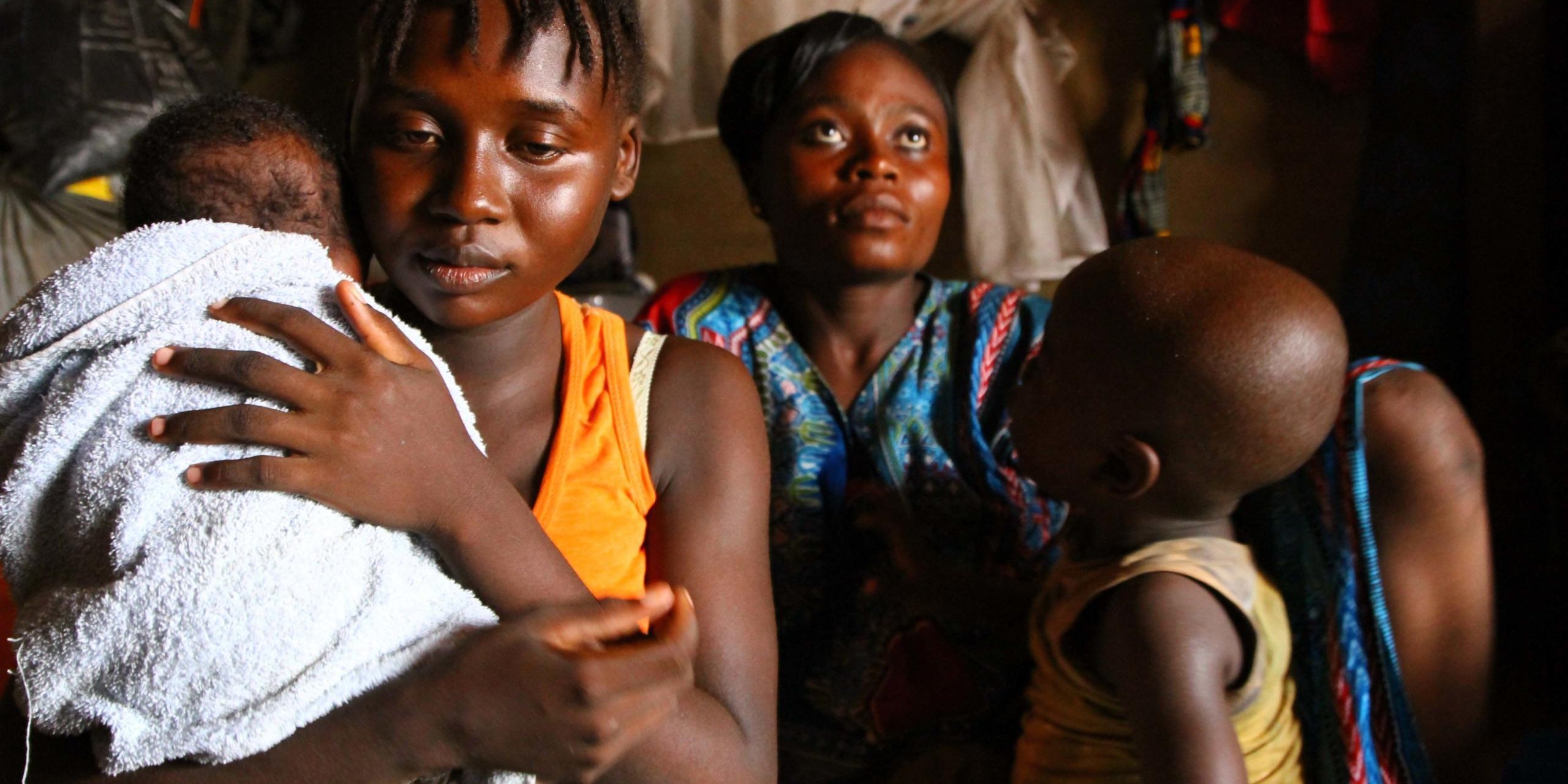 Matindi-Sephora is 19 years old. She had to flee from Kaga Bandoro IDP camp, where she lived for three years, one month ago, after a Seleka attack which killed 37 people. She traveled to Bangui while she was pregnant. Her daughter, Elvira, borned just after her arrival. She was with her sister Mireille, 20 and her son Dieudonné. They would like to go back to Kaga Bandoro but they don't have money and it's difficult to them to be integrated in Ben Zvi IDP camp where 2,000 people are living for three years.
With the number of people food insecure almost doubling in the last year and other humanitarian needs still immense, the humanitarian situation in the Central African Republic (CAR) is getting worse, not better. Some 2.3 million people rely on humanitarian assistance – half the country’s population. An estimated 2 million people are food insecure, compared with 1.2 million people in 2016.
Date: 7 November 2016
Photo credit: NRC/ Edouard Dropsy
