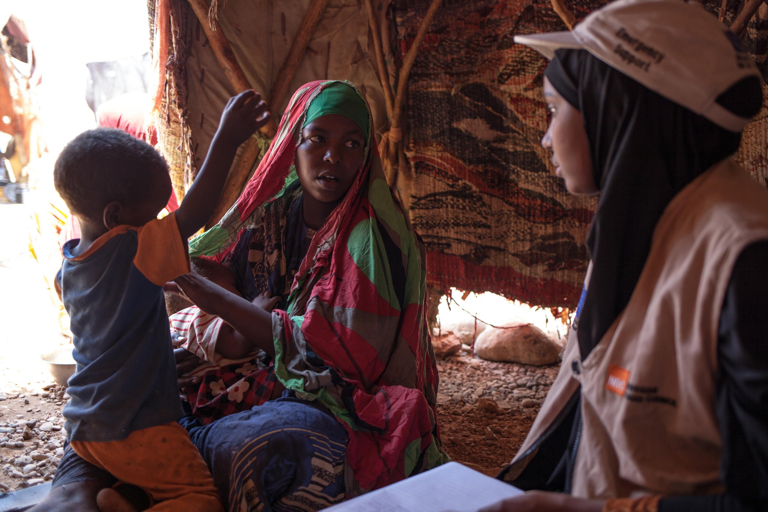 April 8, 2017. Amma Shire, divorced mother of 4 children. Last month, the youngest of the four, Abdirahman, 6 months, died from malnutrition, in Shimbirale's IDP camp, Sanaag region, Somaliland.
Amma and her family arrived there three months ago, after suffering the loss of 150 animals. She received help only once. The 12 kg of rice, and the same amount of flour and sugar are long gone. Mohamed Shire, 23, food security assistant and Ahmed Ibrahim, Norwegian Refugee Council team leader in the East Somaliland are evaluating Amma's needs. She says “we lack support for food and water, but also for health care for my children. It worries me a lot that they are sick and I cannot see a doctor, nor buy medication.”
When they arrived in Shimbirale, the Norwegian Refugee Council saw no other humanitarian organization working, and huge needs. Three people had just died on the day they registered the displaced pastors, and many were very sick. They gave twice Unconditional Money Transfers of 150$ to 100 households, and provided water in this camp of 300 households (approximately 1800 people).
Somalia is experiencing its worst drought in 20 years, following two consecutive seasons of poor rainfall. People are dying of malnutrition. In the worst affected areas, we have seen crops wiped out, livestock killed, and families forced to sell their belongings for food.
Photo credit: Norwegian Refugee Council / Adrienne Surprenant
Date: April, 2017