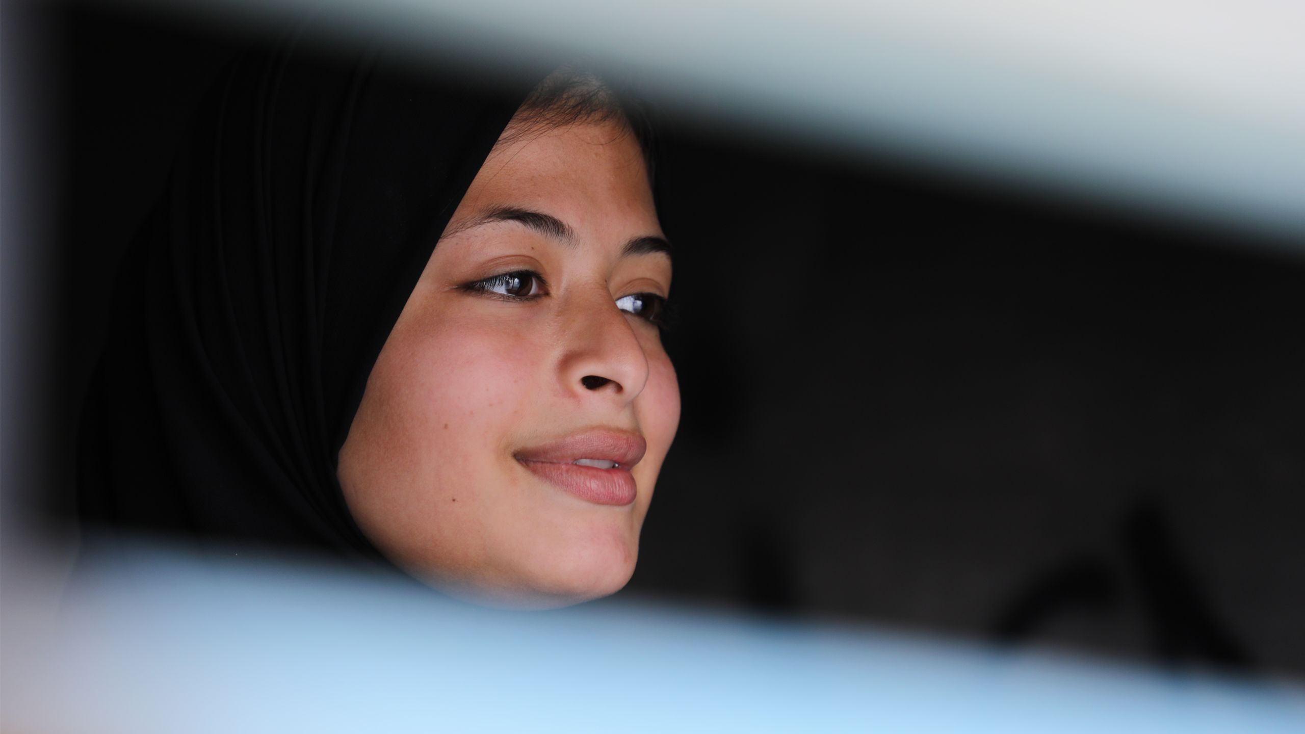 Portrait of Omaia, a 16-year-old Palestinian girl.